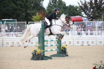 Touch of Marmite rises to the challenge in the Pony Restricted Rider 1.00m Championship